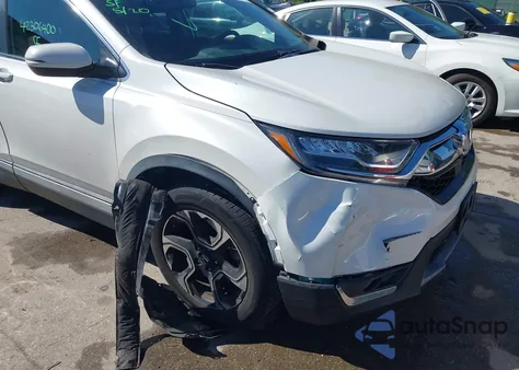 2019 Honda Cr-V Touring z USA, uszkodzony, nr VIN JHLRW2H98KX003911